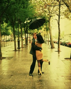 Couple Walking Under Umbrella